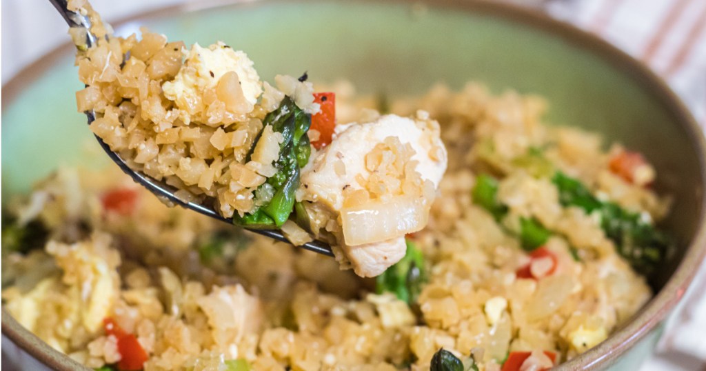 Fork full of cauliflower fried rice