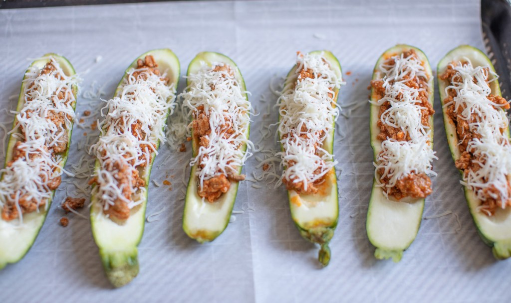 buffalo chicken zucchini boats before going into the oven