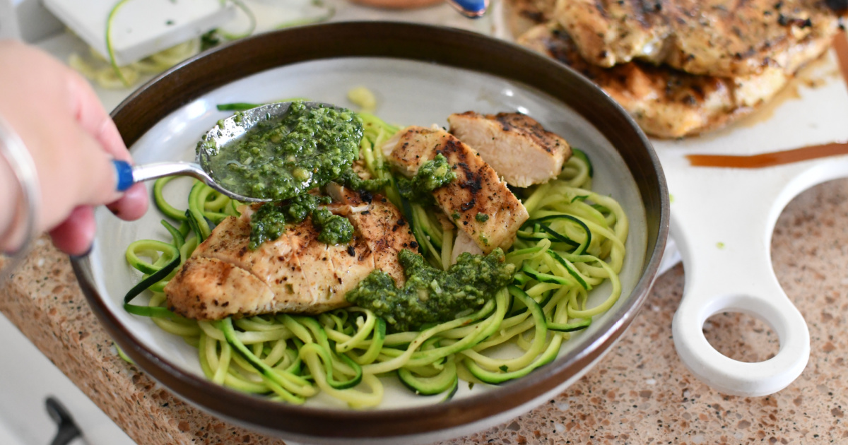 plating chicken pesto with zoodles