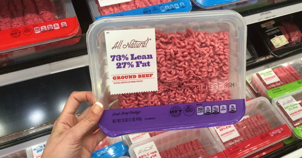 holding package of ground beef at target 