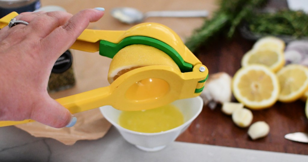 squeezing lemon juice into a bowl