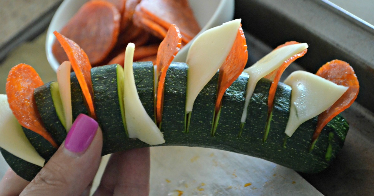 easy pizza stuffed hasselback zucchini - before baking