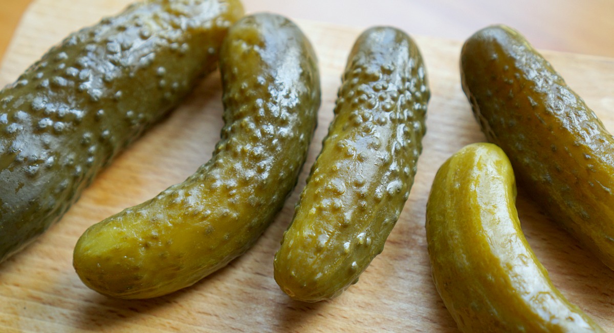 pickles on a cutting board