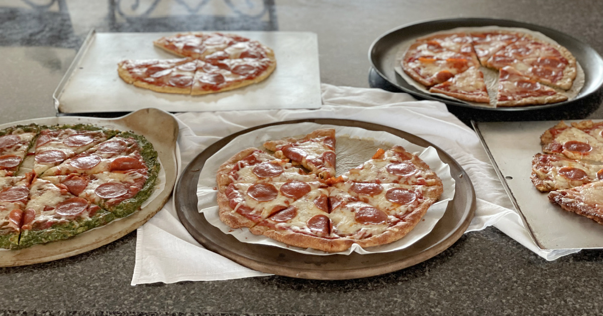 a pizza crust comparison showing seven different low carb pizzas 