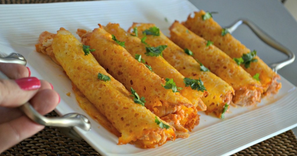 Keto buffalo chicken taquitos on serving dish 