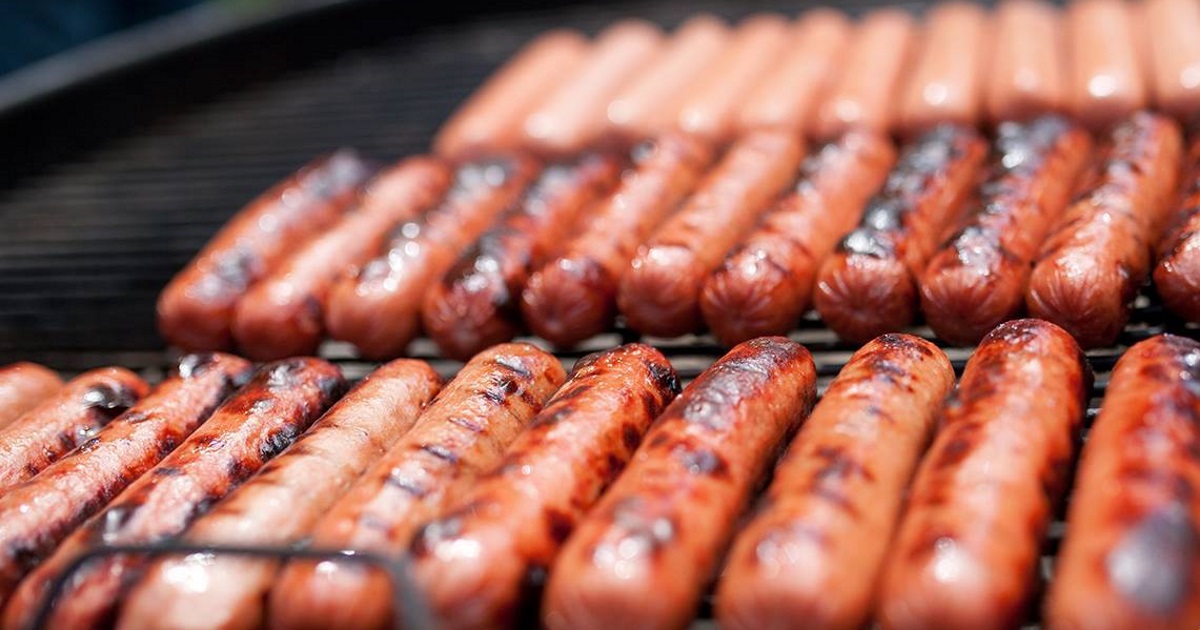 hot dogs on grill