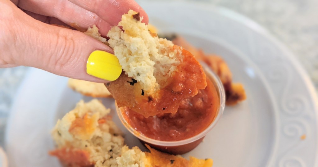 dipping pull apart keto pizza bread bite in marinara