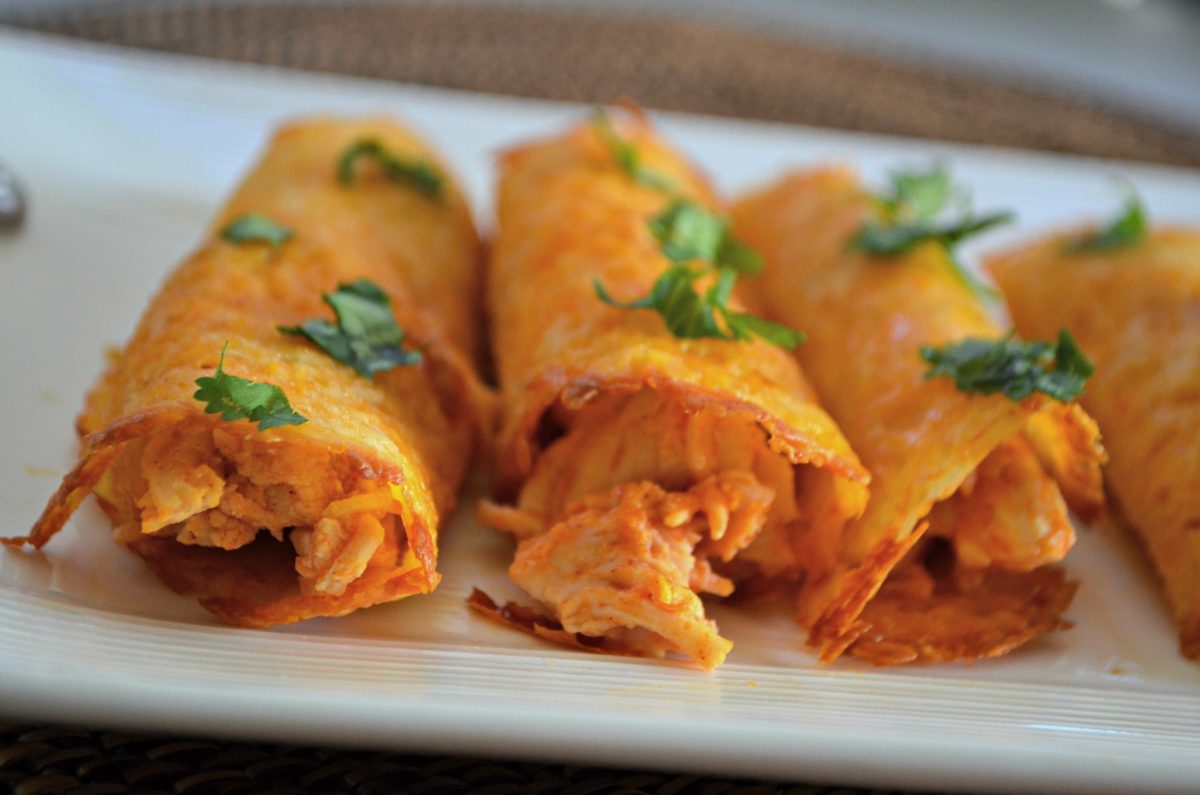 keto buffalo chicken taquitos - closeup on a platter