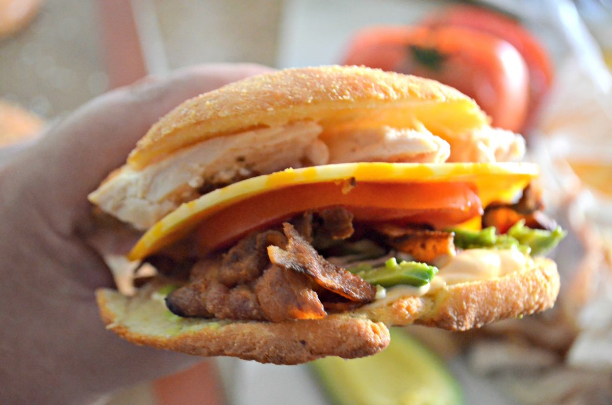 chicken bacon avocado sandwich on a keto roll – Closeup of the assembled sandwich