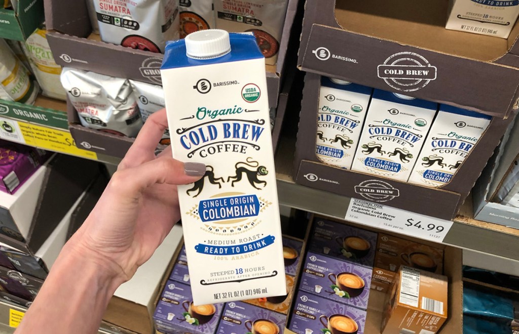 hand holding carton of cold brew coffee