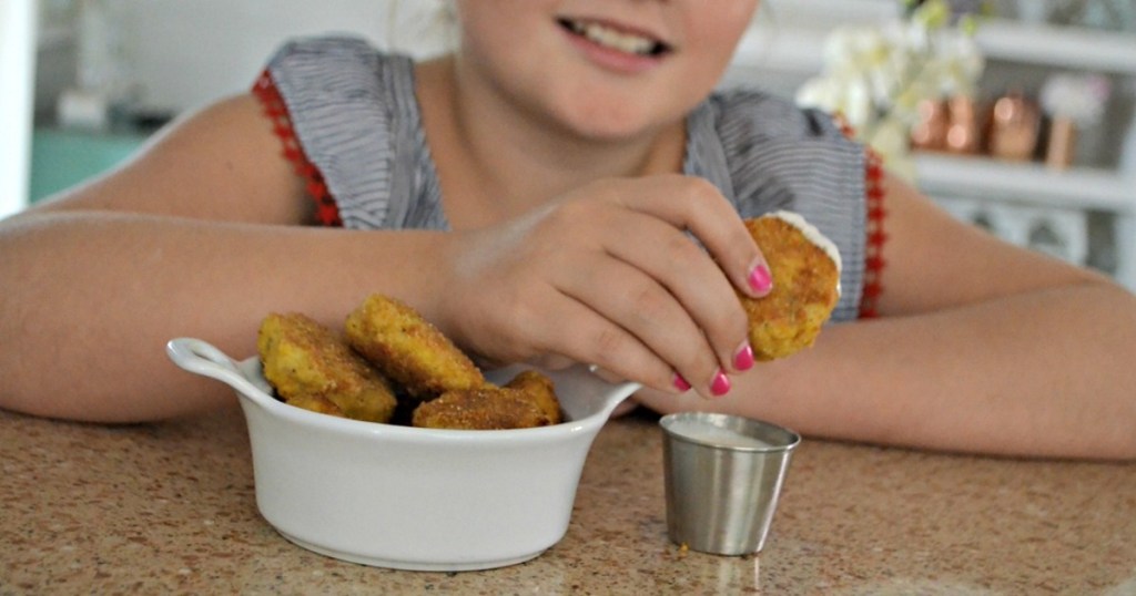 holding keto chicken nugget 