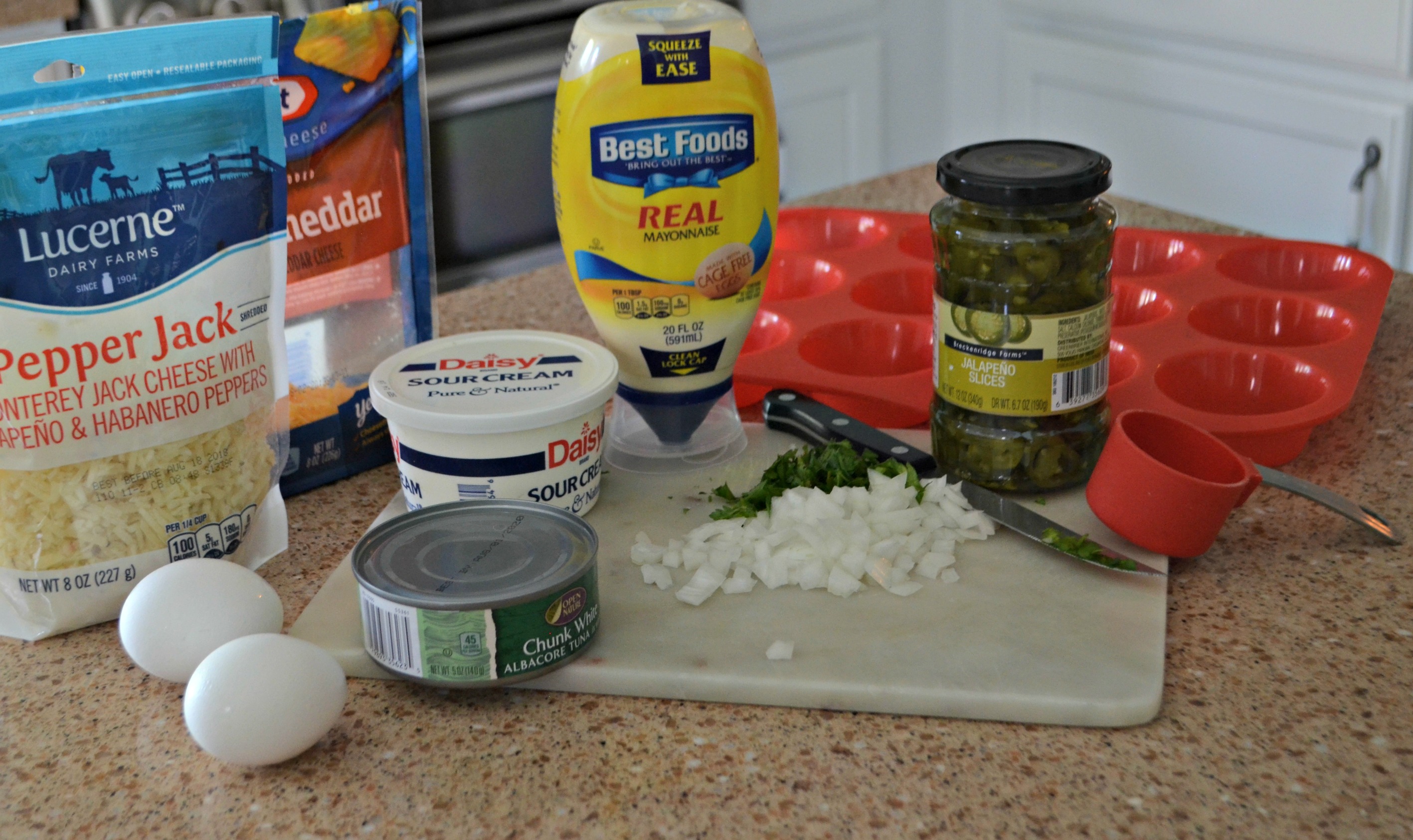 Spicy Keto Tuna Melt egg muffin cup ingredients on the counter