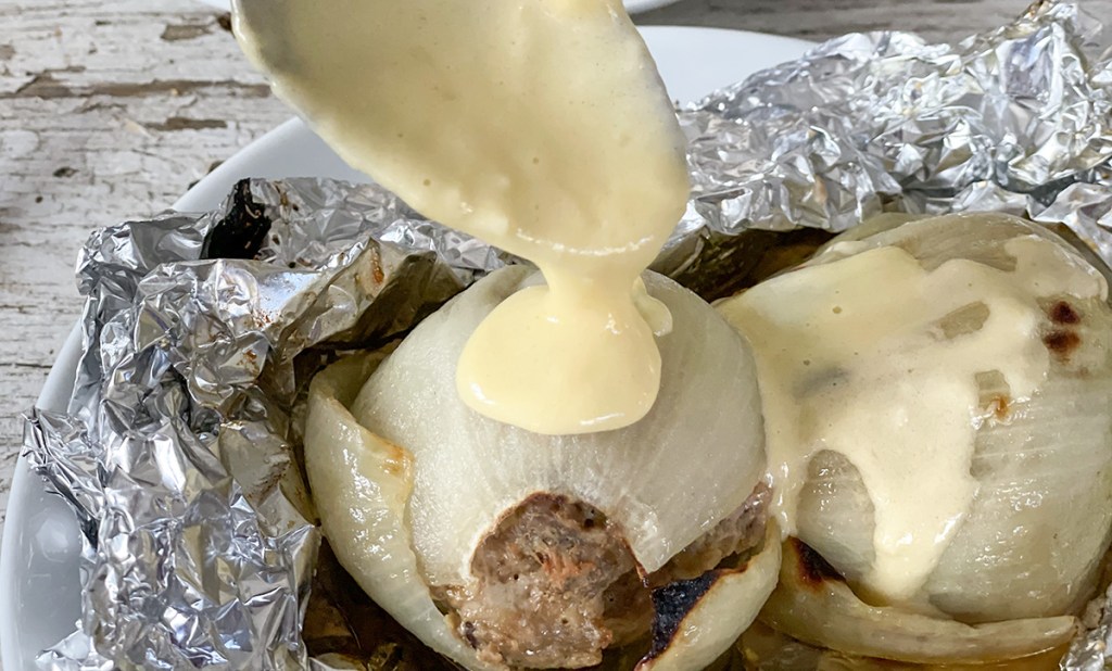 keto onion burger bomb with cheese sauce
