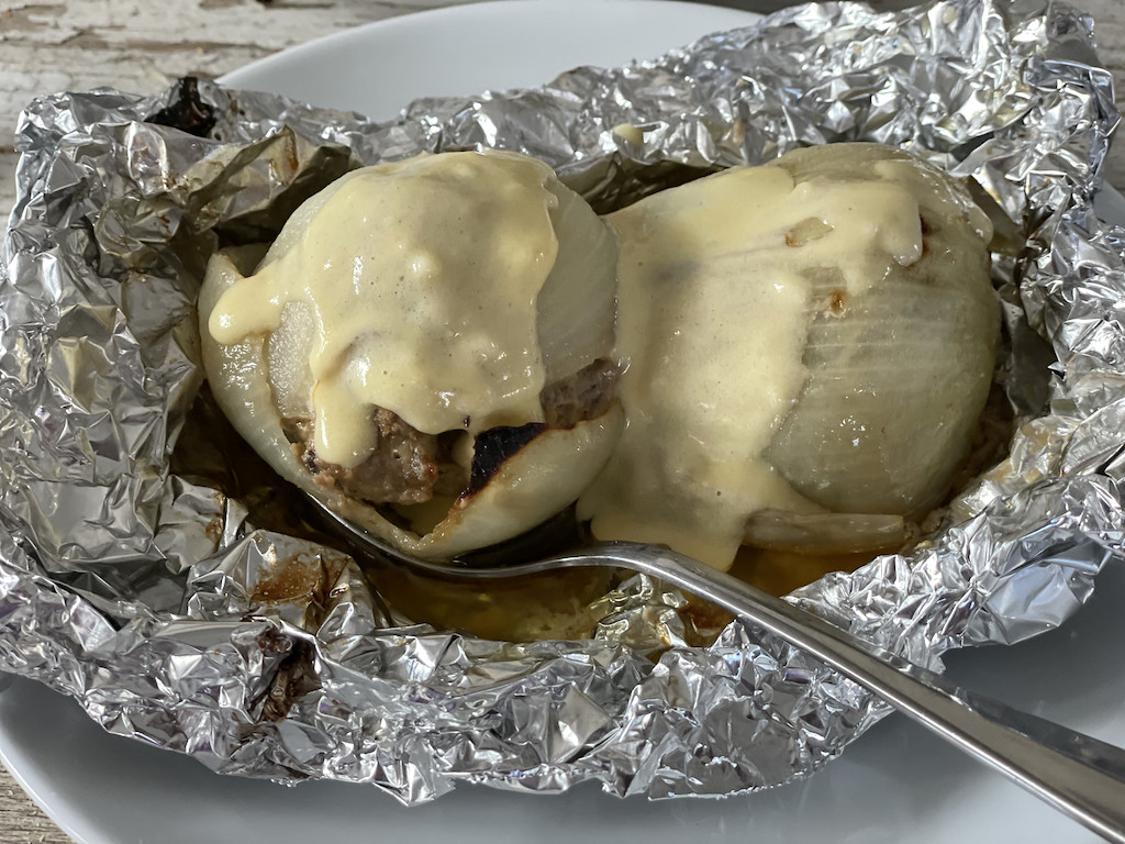 onion bombs in aluminum foil with cheese sauce