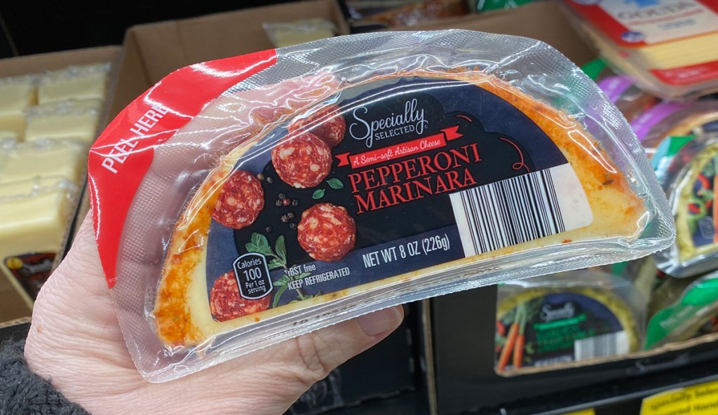 hand holding pepperoni marinara cheese best keto finds aldi