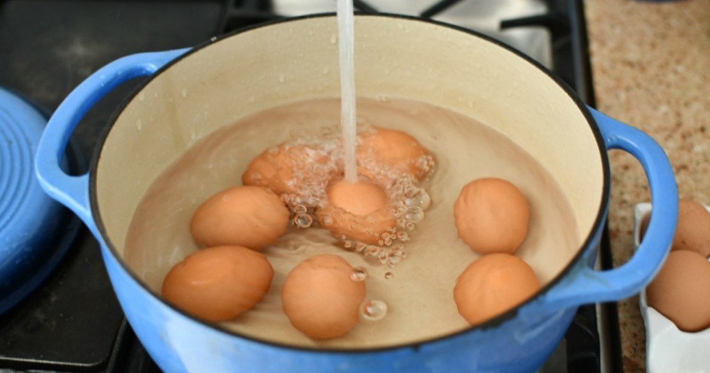 pouring water over eggs