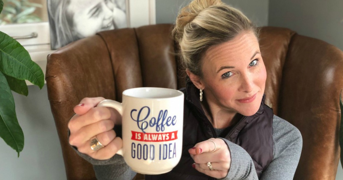 Woman holding 'Coffee is Always a Good Idea' mug