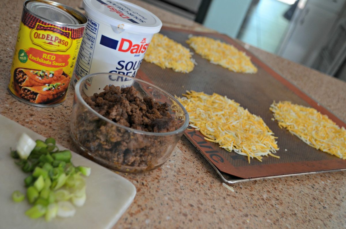 Putting ingredients together for the ground beef keto enchiladas