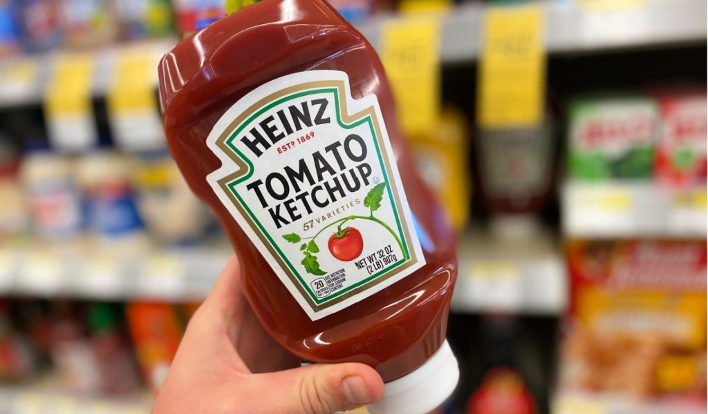 hand holding heinz ketchup with hidden sugar