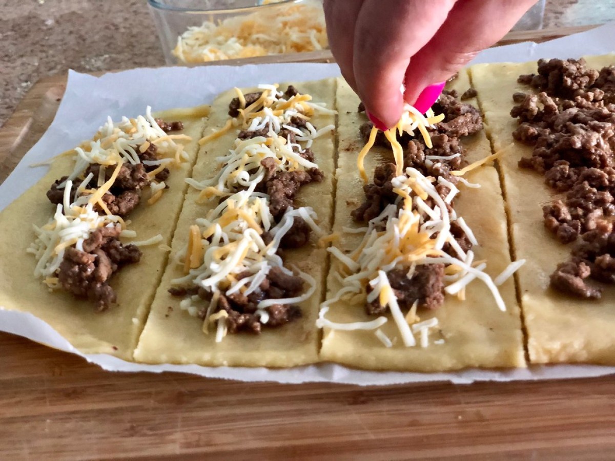 Easy Keto Taco Breadsticks – adding the stuffing toppings