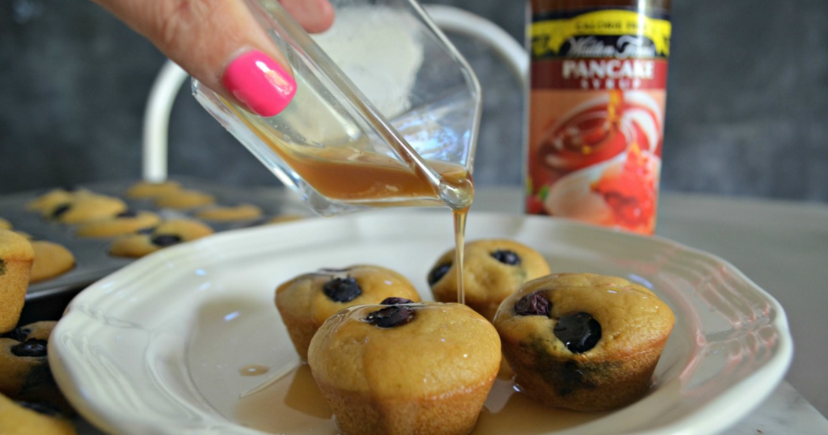 keto mini blueberry pancake bites – pouring syrup over the top
