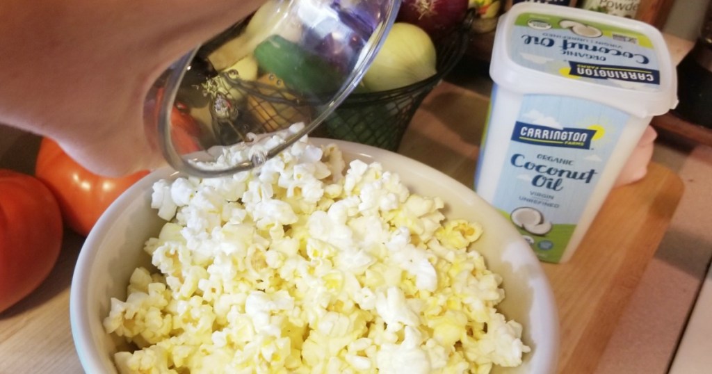 melted carrington coconut oil poured over popcorn