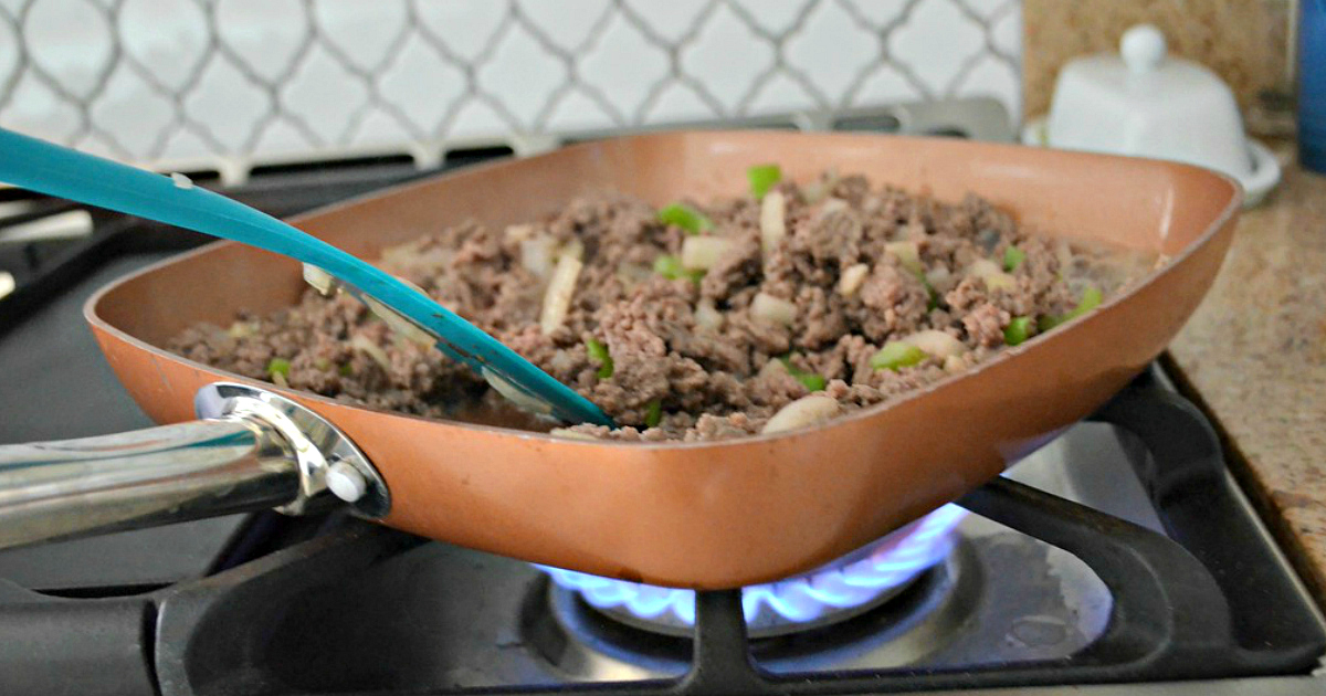 copper chef cookware are the best nonstick pans I own. Shown here on the stove cooking meat