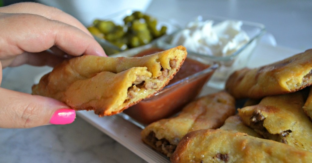 holding stuffed breadstick 