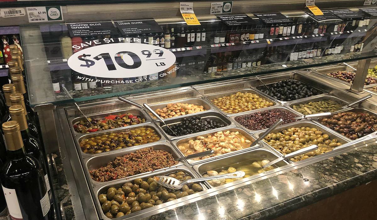 keto whole foods shopping tips to save money — olive bar assortment