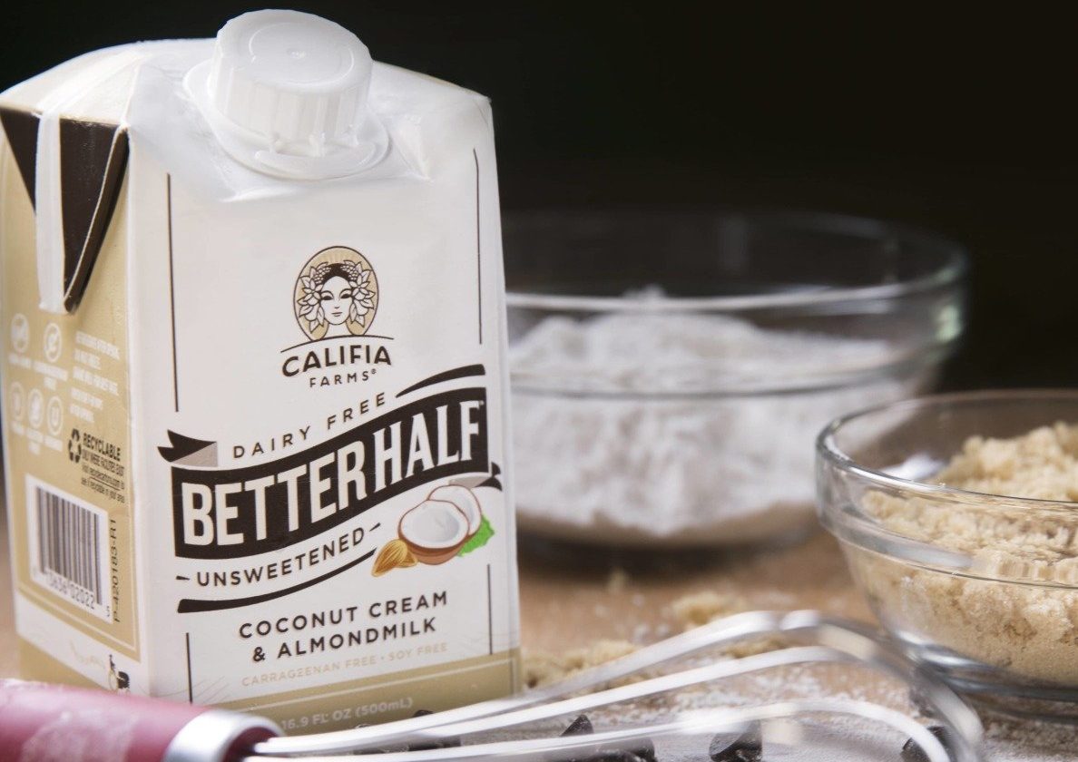 we love Califia Dairy Free coffee creamer - here, the box and a cup of coffee