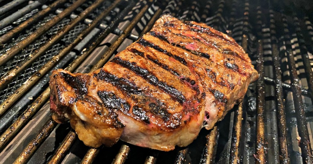 prime new york strip steak on the grill
