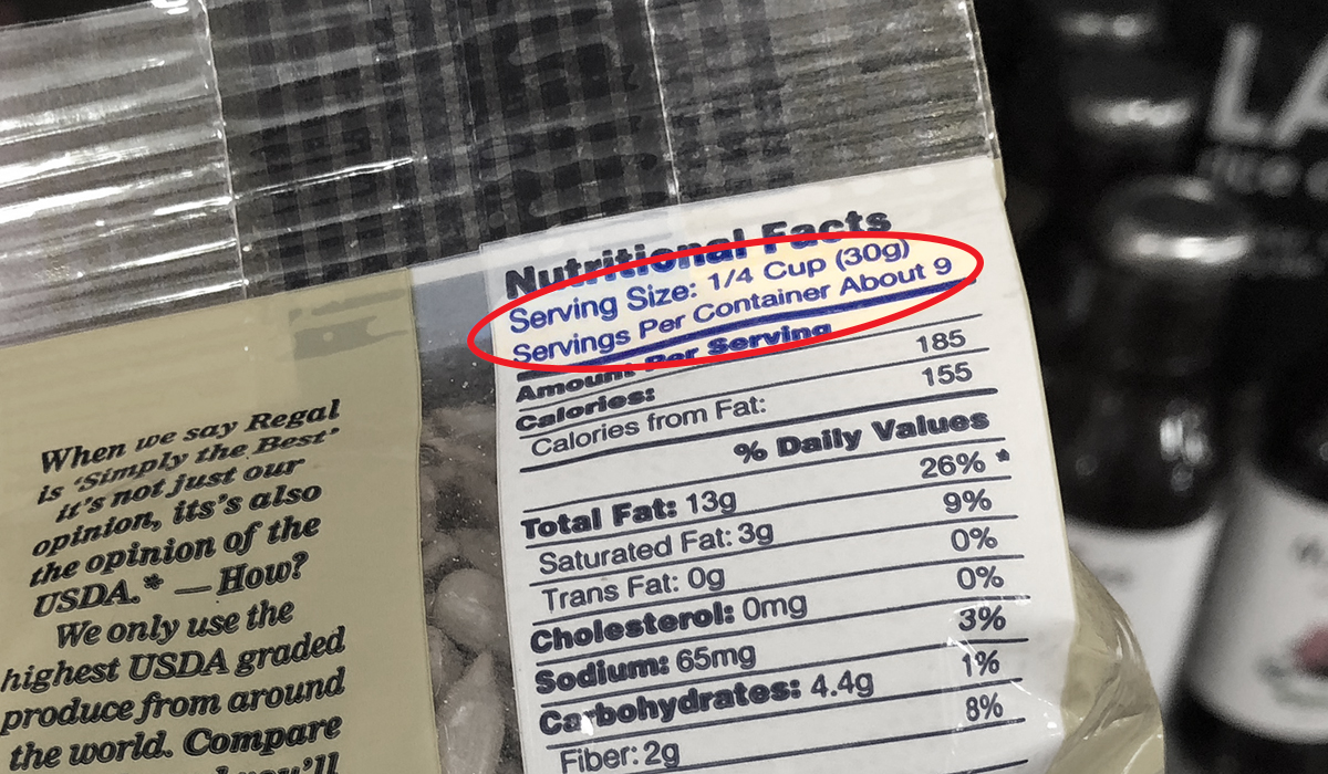 showing how to read nutrition labels by showing the serving size on the back of seed package