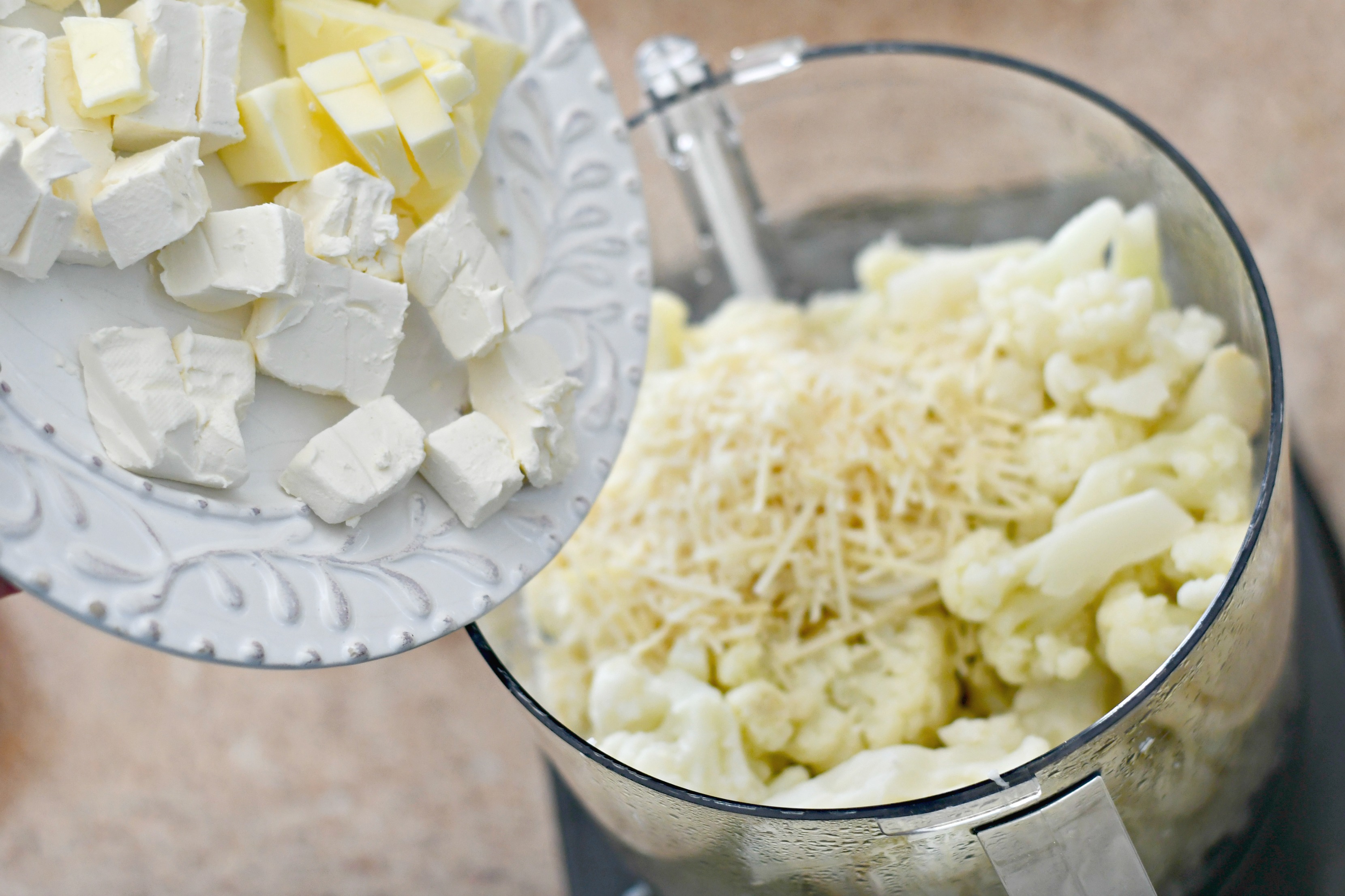 Easy Keto Cauliflower Mashed Potatoes – Adding ingredients to the food processor