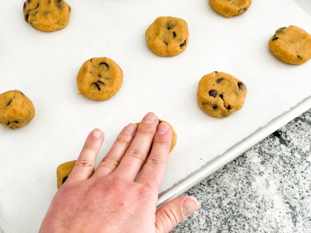 flattening keto pumpkin chocolate chip cookies dough balls
