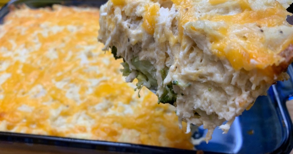 taking out large slice of keto chicken broccoli and cheese casserole 