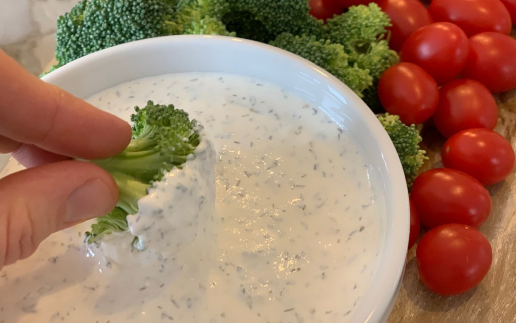 dipping broccoli in keto ranch