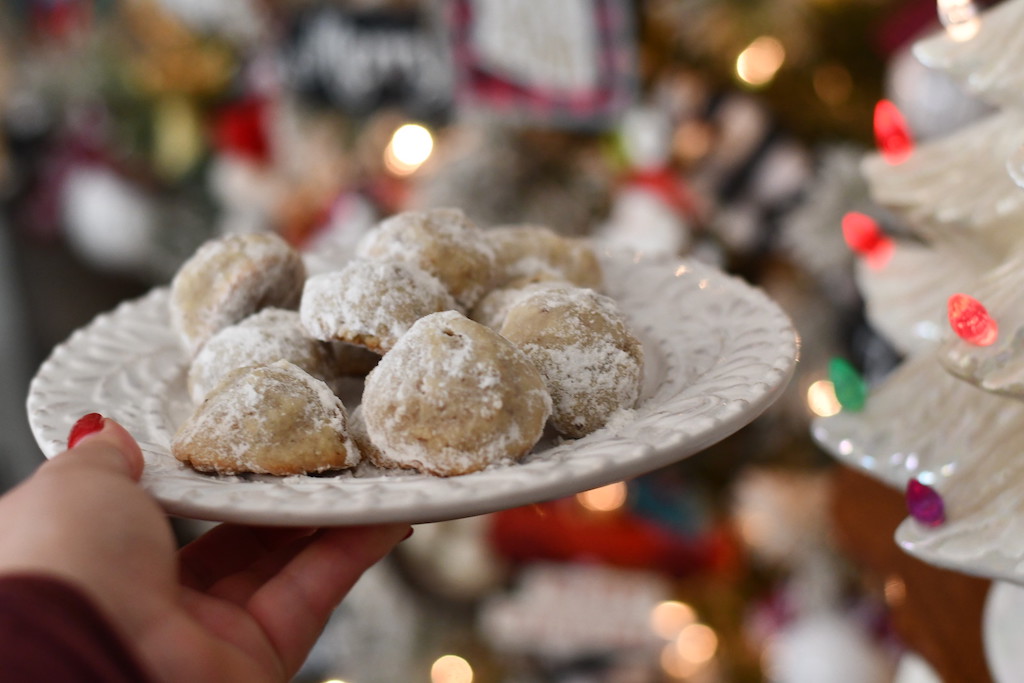 keto snowball cookies on white plate