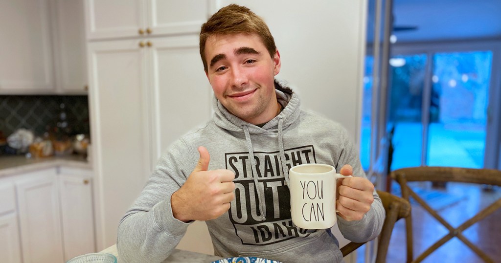 teen with coffee mugs that reads "you can"