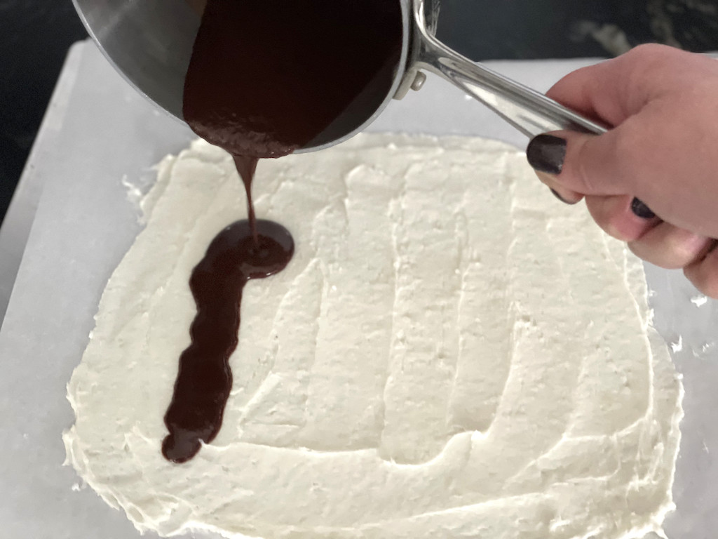 putting keto chocolate on cream spread