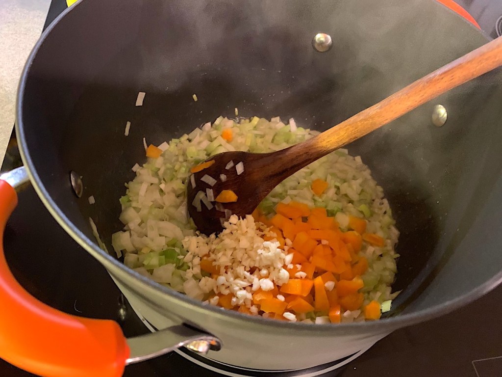 sauteing keto veggies in large saucepan 