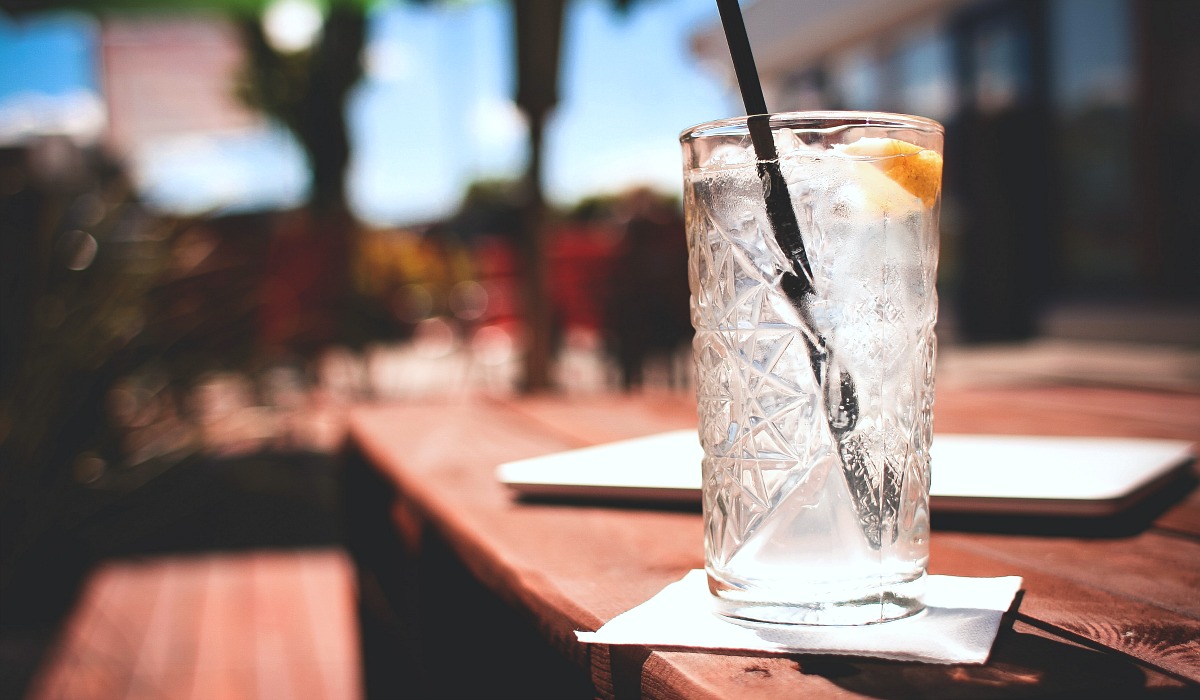eating keto at restaurants — order water over sweetened drinks