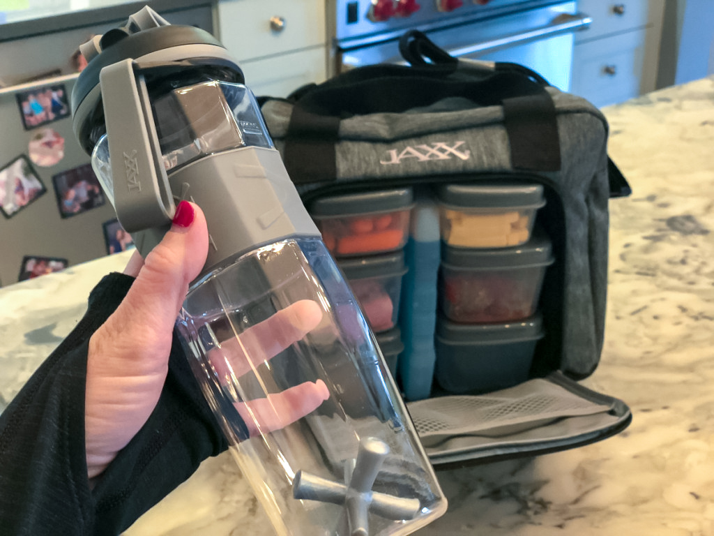 water bottle and meal prep food kit