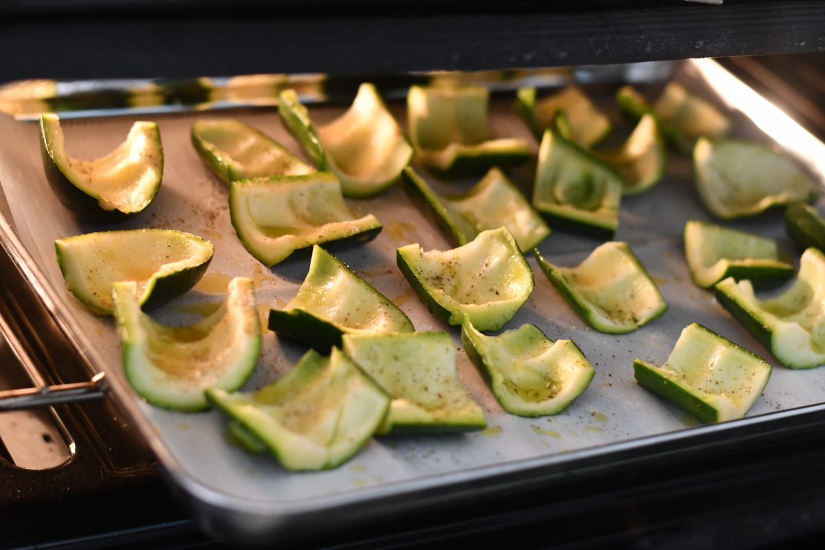 empty zucchini skins baking in the oven