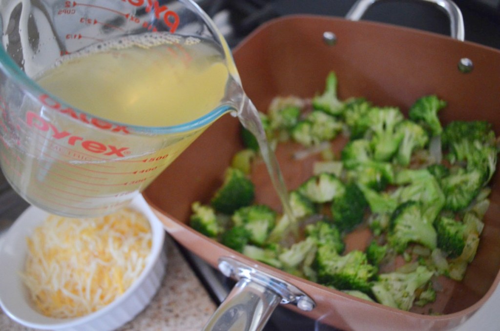 pouring broth into broccoli cheddar soup