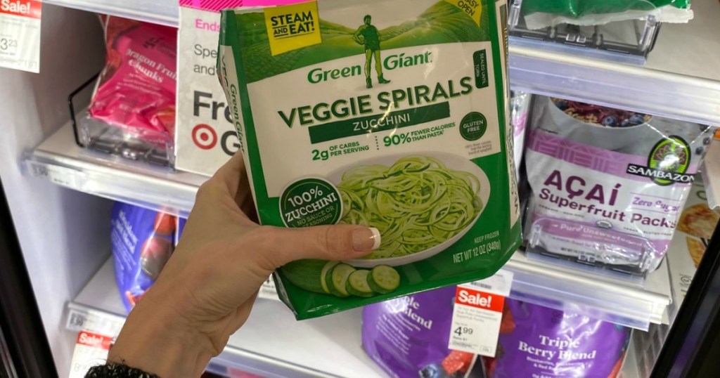 holding bag of Green Giant veggie spirals at Target