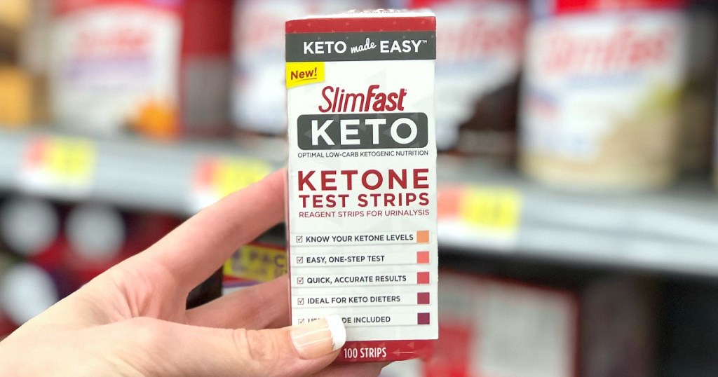 hand holding box of keto test strips