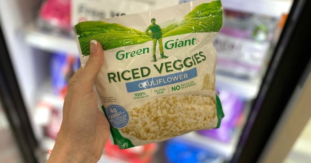 holding bag of Green Giant cauliflower rice at Target