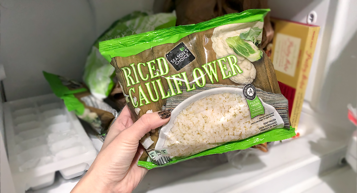 keto kitchen stock up — frozen riced cauliflower in freezer which is an ingredient on our printable keto food list