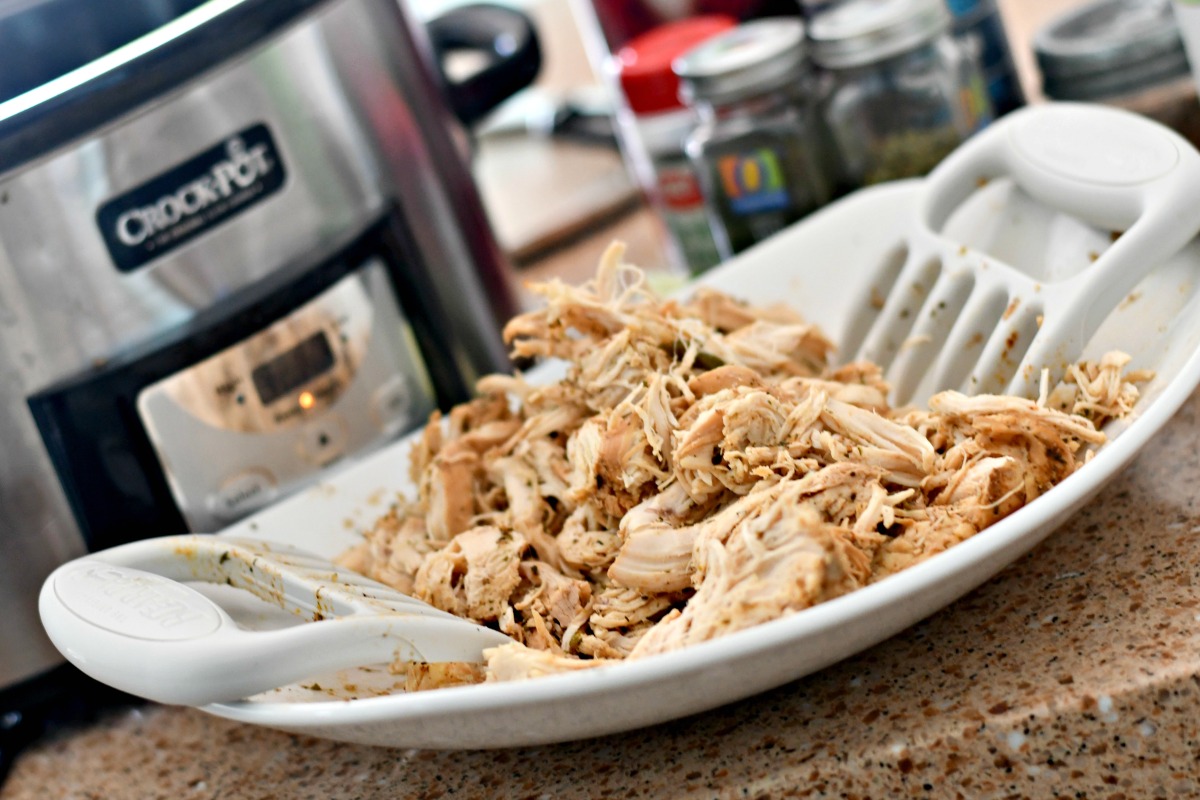 closeup of the keto slow cooker shredded chicken tacos on a platter for serving