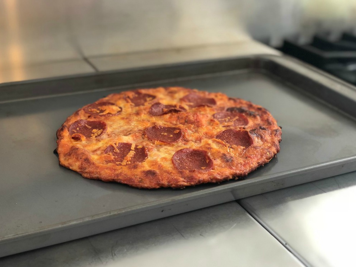 Quest pizza cooked on a pan